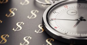 Ticking clock against money background